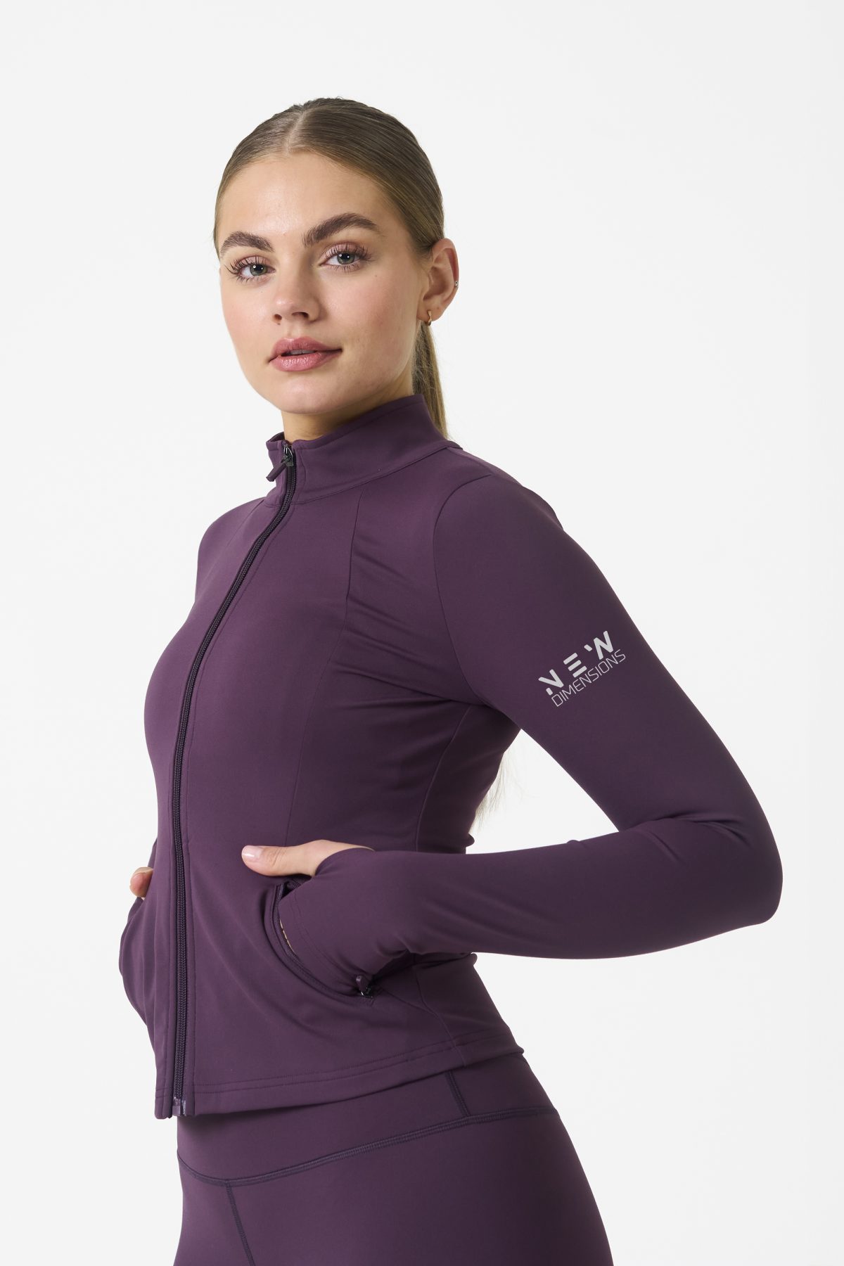 Elevate your activewear game with the Legacy Zip Jacket (Plum), designed for those who value movement, support, and unmatched comfort. Crafted from a premium blend of 75% Nylon and 25% Spandex, this jacket offers a lightweight yet durable feel that keeps you supported during any activity.