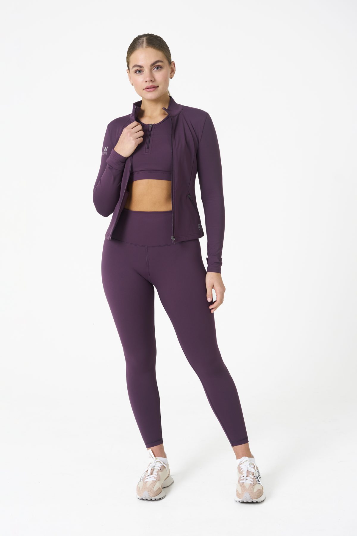 Elevate your activewear game with the Legacy Zip Jacket (Plum), designed for those who value movement, support, and unmatched comfort. Crafted from a premium blend of 75% Nylon and 25% Spandex, this jacket offers a lightweight yet durable feel that keeps you supported during any activity.