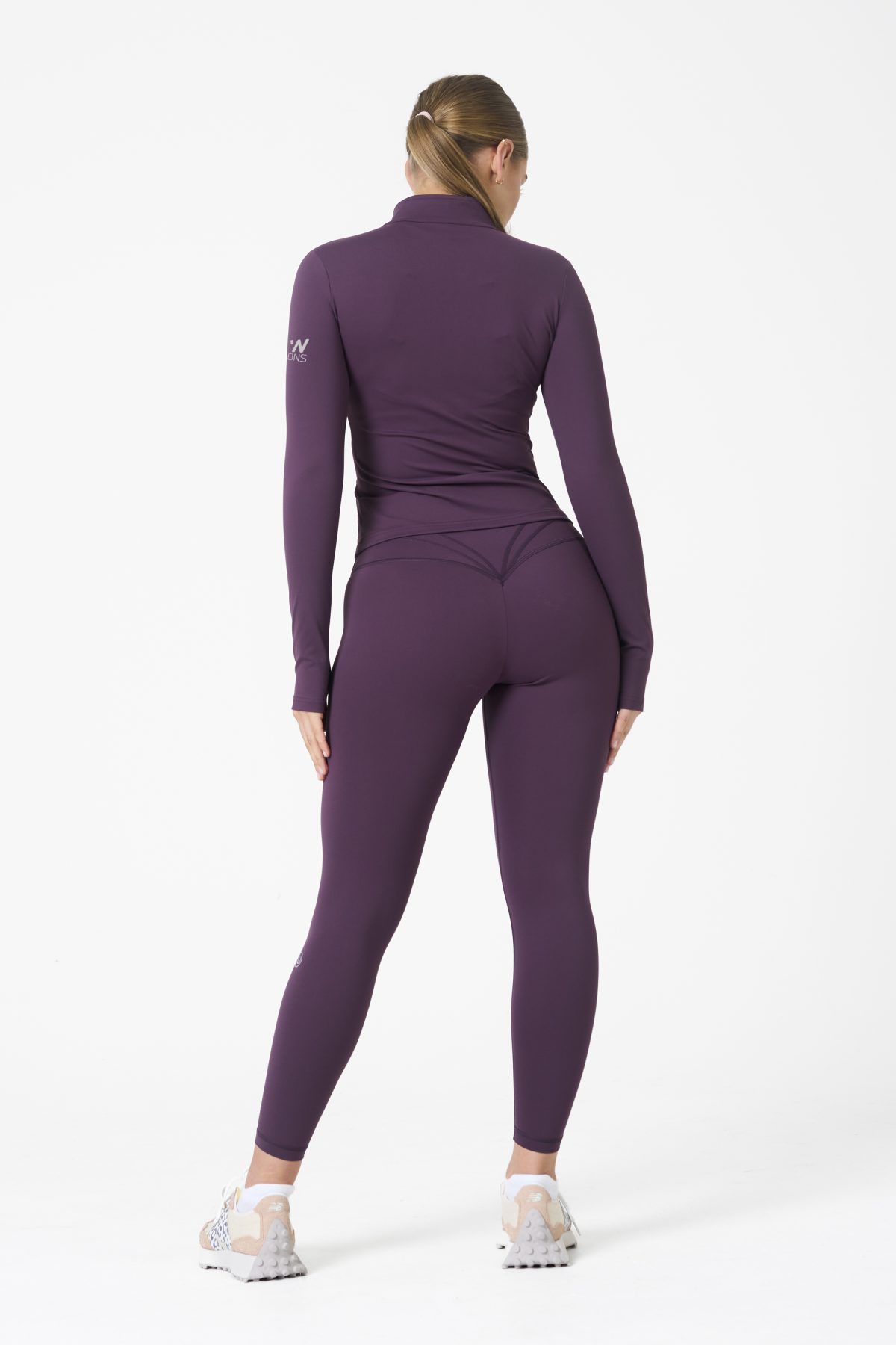 Elevate your activewear game with the Legacy Zip Jacket (Plum), designed for those who value movement, support, and unmatched comfort. Crafted from a premium blend of 75% Nylon and 25% Spandex, this jacket offers a lightweight yet durable feel that keeps you supported during any activity.