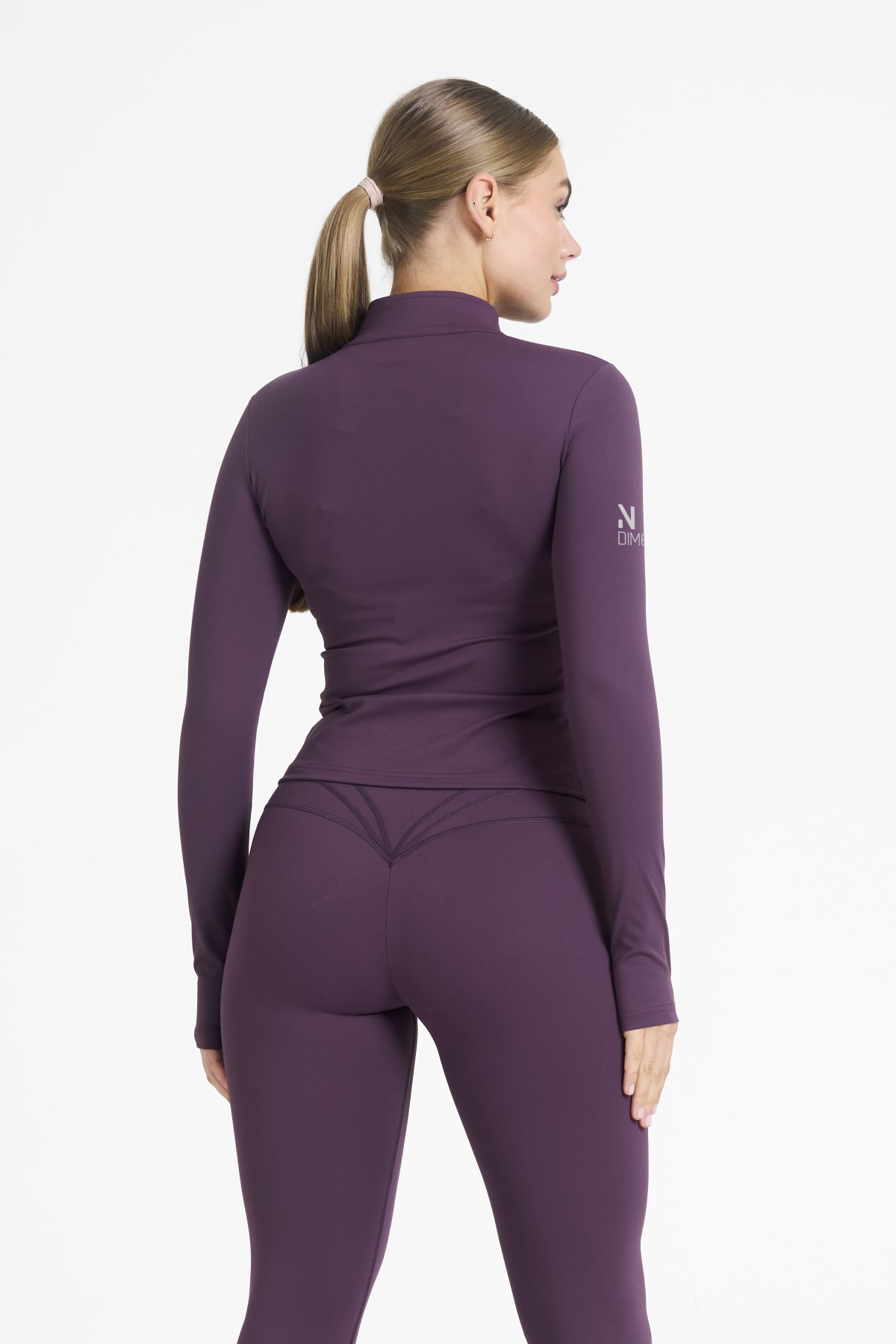 Elevate your activewear game with the Legacy Zip Jacket (Plum), designed for those who value movement, support, and unmatched comfort. Crafted from a premium blend of 75% Nylon and 25% Spandex, this jacket offers a lightweight yet durable feel that keeps you supported during any activity.