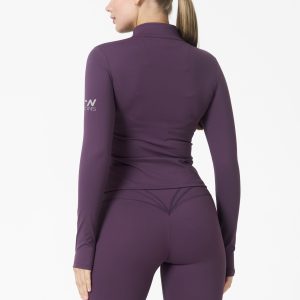 Elevate your activewear game with the Legacy Zip Jacket (Plum), designed for those who value movement, support, and unmatched comfort. Crafted from a premium blend of 75% Nylon and 25% Spandex, this jacket offers a lightweight yet durable feel that keeps you supported during any activity.