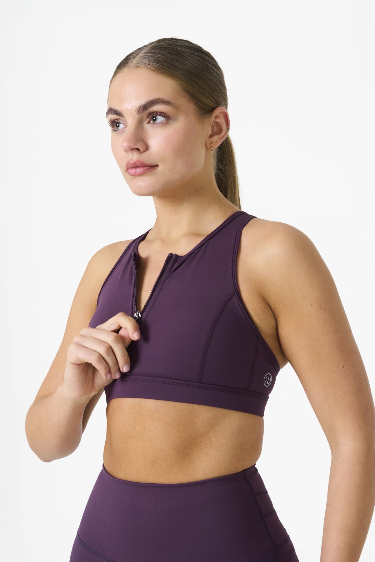 Elevate your workout wardrobe with the Legacy Zip Bra (Plum) from our Legacy Activewear Collection. Designed for movement, support, and ultimate comfort, this sports bra combines functionality with trend-forward style.