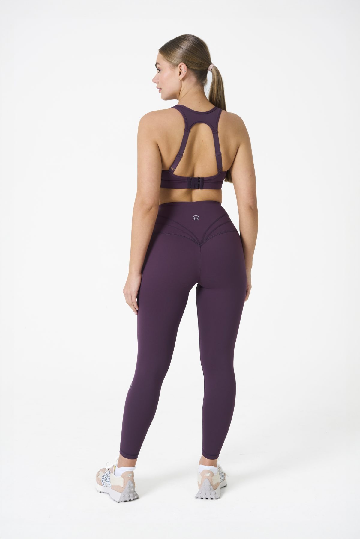 Elevate your workout wardrobe with the Legacy Legging (Plum), designed to empower every movement. Part of our Legacy Activewear Collection, these leggings combine superior support, unmatched comfort, and timeless style. Featuring a high-waisted fit with a flat-line drawstring for adjustable comfort, these leggings are crafted to stay put through every squat, lunge, and stretch. The back-enhanced detail adds a flattering finish, making these leggings a staple for both gym sessions and casual wear.