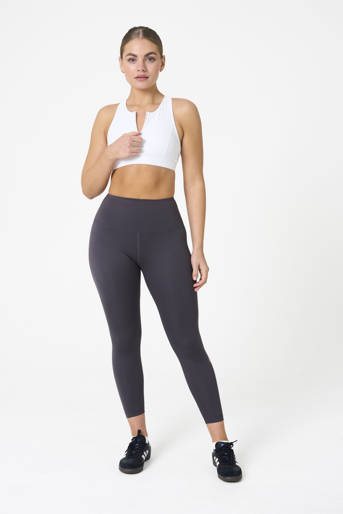 Elevate your workout wardrobe with the Legacy Zip Bra (White) from our Legacy Activewear Collection. Designed for movement, support, and ultimate comfort, this sports bra combines functionality with trend-forward style.