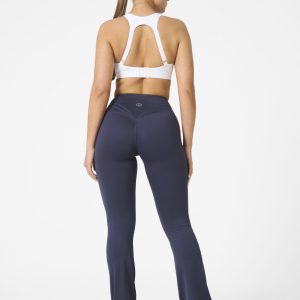 Move freely and confidently with the Legacy Flare Legging (Dark Grey), designed for comfort, support, and style. Part of our Legacy Activewear Collection, this legging combines innovative features with a modern flair to elevate your active wardrobe. The high-waisted design ensures a secure fit, while the flatline drawstring offers customizable support for every movement. The subtle back-enhanced detail adds a sculpted, flattering touch. The flare silhouette delivers a trendy yet functional look, giving you ease of movement whether you're in the gym or out and about.