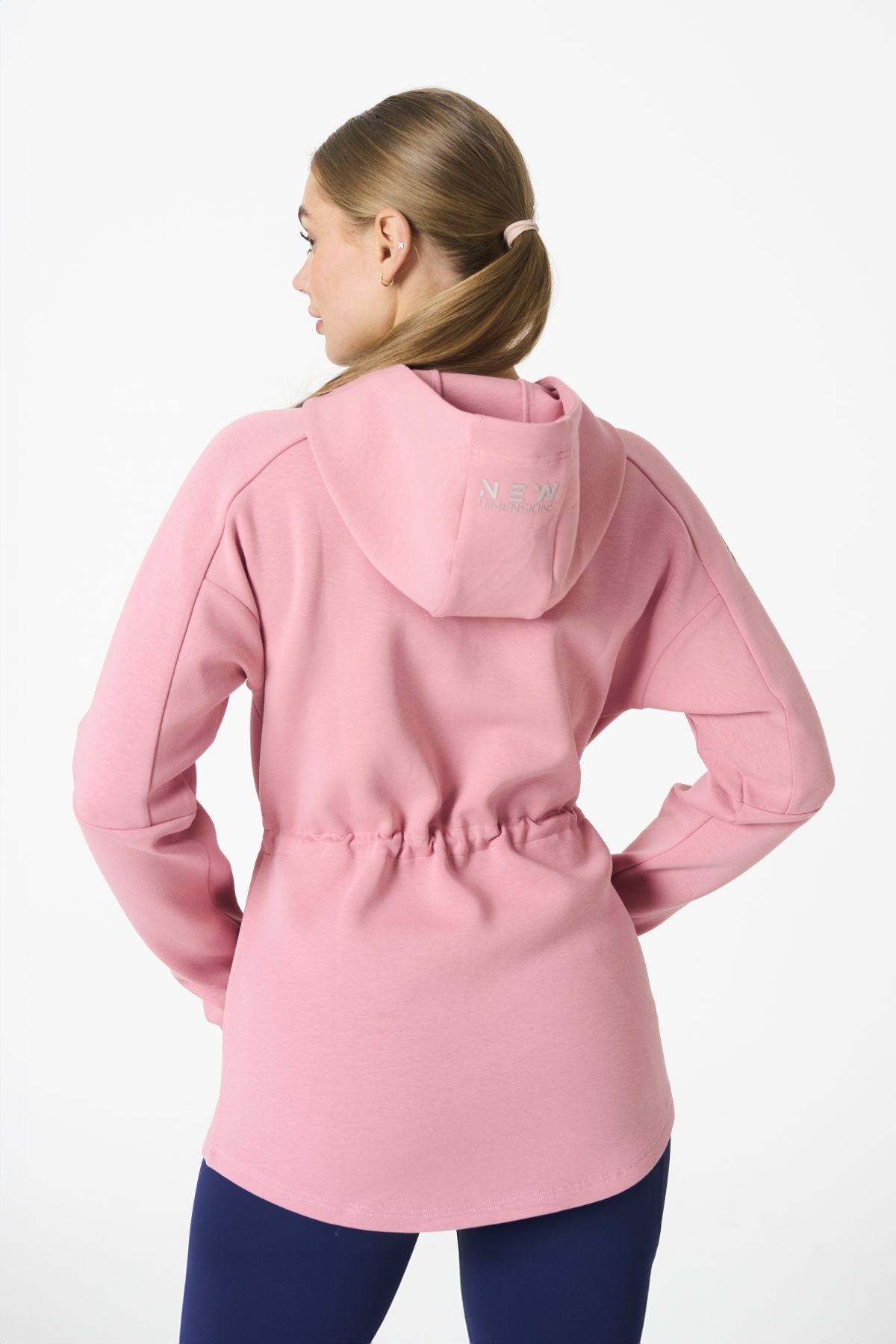 Elevate your activewear game with the Legacy Zip Hoodie (Blush Pink) from our Legacy Activewear Collection. Designed for ultimate movement, support, and comfort, this hoodie seamlessly blends practicality with style. The full-zip closure offers effortless wearability, while the adjustable hood and elasticated waist ensure a personalized fit. Perfect for your on-the-go lifestyle, it features two convenient pockets: a secure zipped pocket for essentials and a classic open pocket for quick access. The Legacy Zip Hoodie is your go-to for both functionality and trend-forward fashion.