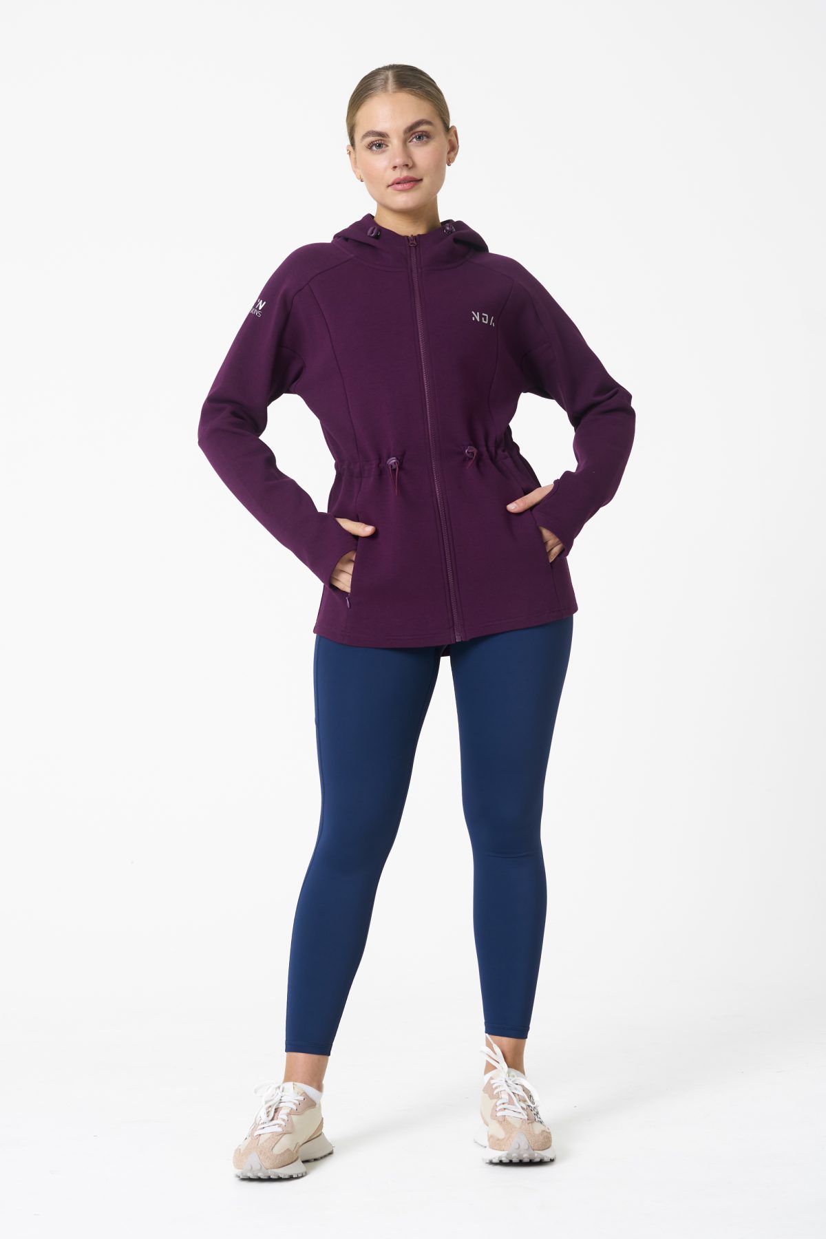 Elevate your activewear game with the Legacy Zip Hoodie (Mulberry) from our Legacy Activewear Collection. Designed for ultimate movement, support, and comfort, this hoodie seamlessly blends practicality with style. The full-zip closure offers effortless wearability, while the adjustable hood and elasticated waist ensure a personalized fit. Perfect for your on-the-go lifestyle, it features two convenient pockets: a secure zipped pocket for essentials and a classic open pocket for quick access. The Legacy Zip Hoodie is your go-to for both functionality and trend-forward fashion.