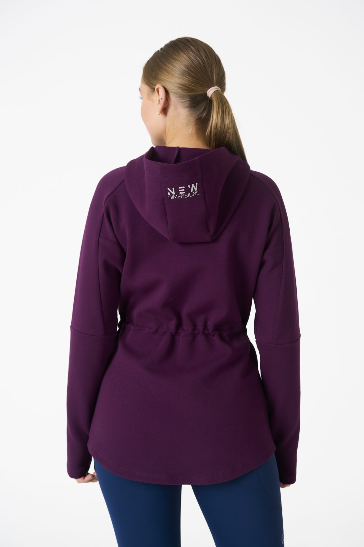 Elevate your activewear game with the Legacy Zip Hoodie (Mulberry) from our Legacy Activewear Collection. Designed for ultimate movement, support, and comfort, this hoodie seamlessly blends practicality with style. The full-zip closure offers effortless wearability, while the adjustable hood and elasticated waist ensure a personalized fit. Perfect for your on-the-go lifestyle, it features two convenient pockets: a secure zipped pocket for essentials and a classic open pocket for quick access. The Legacy Zip Hoodie is your go-to for both functionality and trend-forward fashion.