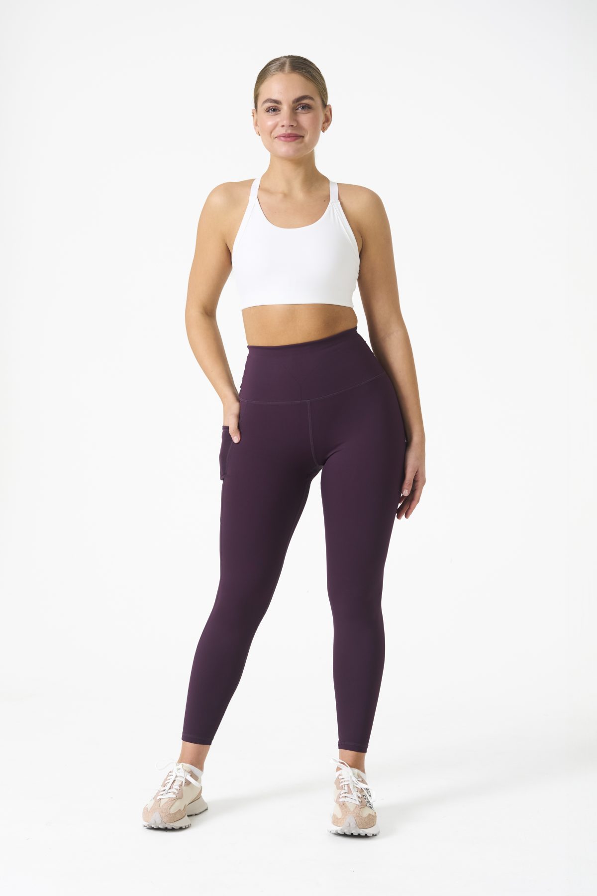 Introducing our all-new Compression 4.0 Legging (Plum) - the upgraded version of our best-selling Compression 3.0 with an exciting addition of an enhanced back detail! Designed to elevate your workout experience, these leggings offer the same incredible features you know and love, with some added enhancements.