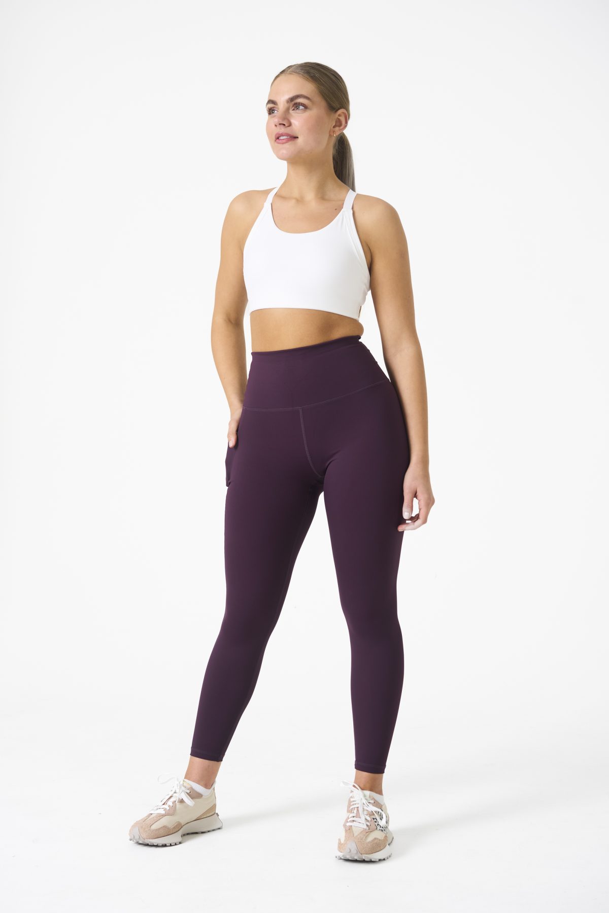 Introducing our all-new Compression 4.0 Legging (Plum) - the upgraded version of our best-selling Compression 3.0 with an exciting addition of an enhanced back detail! Designed to elevate your workout experience, these leggings offer the same incredible features you know and love, with some added enhancements.