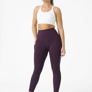 Introducing our all-new Compression 4.0 Legging (Plum) - the upgraded version of our best-selling Compression 3.0 with an exciting addition of an enhanced back detail! Designed to elevate your workout experience, these leggings offer the same incredible features you know and love, with some added enhancements.
