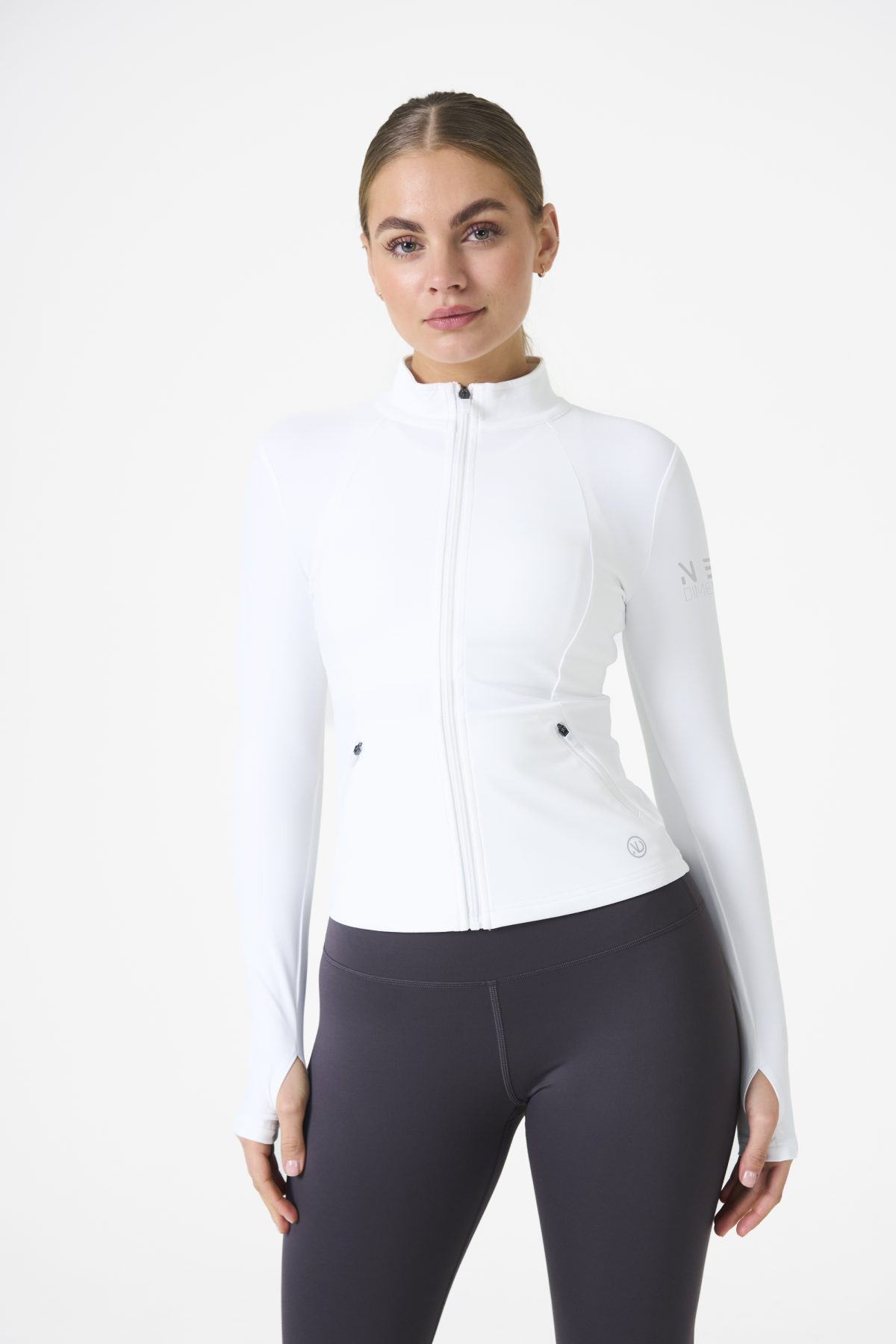 Elevate your activewear game with the Legacy Zip Jacket (White), designed for those who value movement, support, and unmatched comfort. Crafted from a premium blend of 75% Nylon and 25% Spandex, this jacket offers a lightweight yet durable feel that keeps you supported during any activity.