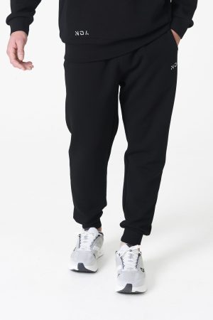 Part of the Elements Activewear Collection, the Legacy Men's Jogger (Black) is designed for movement, comfort, and everyday versatility. Crafted with a premium blend of 74% Nylon, 20% Polyester, and 6% Spandex, this jogger offers a soft, stretchy fit that feels as good as it performs.