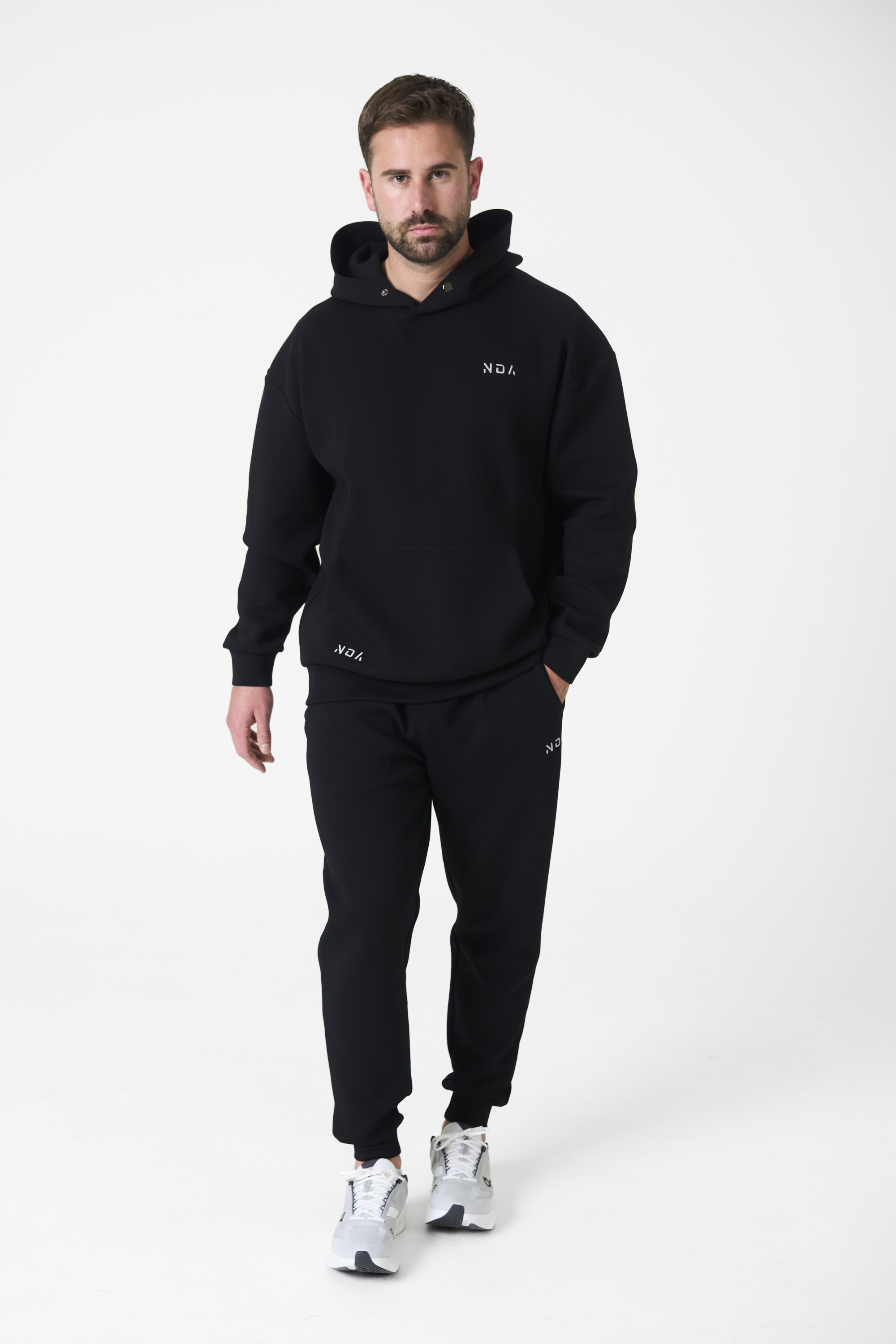 Elevate your comfort and style with the Legacy Men's Hoodie (Black), a perfect blend of functionality and fashion. Designed for everyday wear, this hoodie is crafted with a premium fabric blend of 74% Nylon, 20% Polyester, and 20% Spandex, ensuring a luxuriously soft feel, durability, and flexibility for any activity.