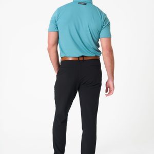 Stay sharp and comfortable, whether you're hitting the office or the golf course. The Elements Golf Trouser (Black) is designed to keep your look fresh and functional with a lightweight build ideal for warmer months. Featuring a blend of nylon and spandex, it offers exceptional stretch and freedom of movement, ensuring comfort for your swing on the course or long hours at the desk.