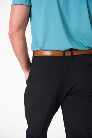 Stay sharp and comfortable, whether you're hitting the office or the golf course. The Elements Golf Trouser (Black) is designed to keep your look fresh and functional with a lightweight build ideal for warmer months. Featuring a blend of nylon and spandex, it offers exceptional stretch and freedom of movement, ensuring comfort for your swing on the course or long hours at the desk.