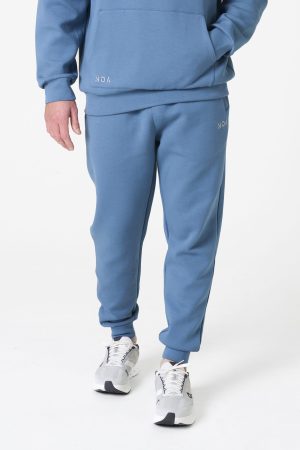 Part of the Elements Activewear Collection, the Legacy Men's Jogger (Blue) is designed for movement, comfort, and everyday versatility. Crafted with a premium blend of 74% Nylon, 20% Polyester, and 6% Spandex, this jogger offers a soft, stretchy fit that feels as good as it performs.