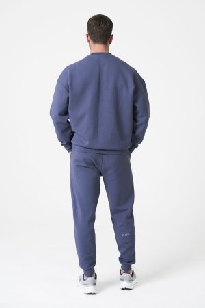 Part of the Elements Activewear Collection, the Legacy Men's Jogger (Petrol Grey) is designed for movement, comfort, and everyday versatility. Crafted with a premium blend of 74% Nylon, 20% Polyester, and 6% Spandex, this jogger offers a soft, stretchy fit that feels as good as it performs.