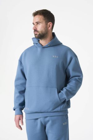 Elevate your comfort and style with the Legacy Men's Hoodie (Blue), a perfect blend of functionality and fashion. Designed for everyday wear, this hoodie is crafted with a premium fabric blend of 74% Nylon, 20% Polyester, and 20% Spandex, ensuring a luxuriously soft feel, durability, and flexibility for any activity.
