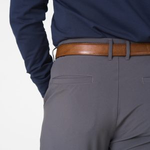 Stay sharp and comfortable, whether you're hitting the office or the golf course. The Elements Golf Trouser (Grey) is designed to keep your look fresh and functional with a lightweight build ideal for warmer months. Featuring a blend of nylon and spandex, it offers exceptional stretch and freedom of movement, ensuring comfort for your swing on the course or long hours at the desk.