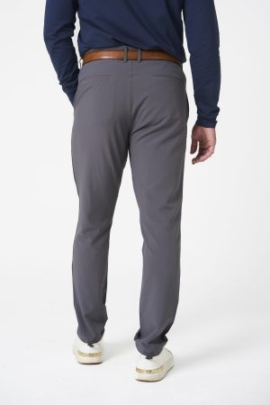 Stay sharp and comfortable, whether you're hitting the office or the golf course. The Elements Golf Trouser (Grey) is designed to keep your look fresh and functional with a lightweight build ideal for warmer months. Featuring a blend of nylon and spandex, it offers exceptional stretch and freedom of movement, ensuring comfort for your swing on the course or long hours at the desk.