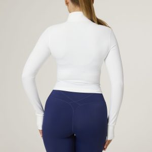 Elevate your activewear game with the Tapered Zip Jacket (White) from our Elements Collection. Designed with a modern, short-length cut, this jacket provides a sleek, fitted fit that complements your every move. Crafted from a premium blend of 75% Nylon and 25% Spandex, it offers the perfect balance of stretch and durability to keep up with your active lifestyle.