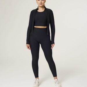 The Signature Rib Zip Jacket (Black) is the perfect fusion of structure and softness — designed to enhance your shape while keeping comfort at the forefront. Crafted from premium ribbed fabric with just the right amount of stretch, this jacket contours effortlessly to your body. The full-zip front offers versatile styling, while the seamless collar keeps the look sleek and streamlined. A subtle logo detail on the side adds a premium, understated touch. Whether you're heading to the studio or layering up post-workout, this jacket moves with you and flatters every angle.