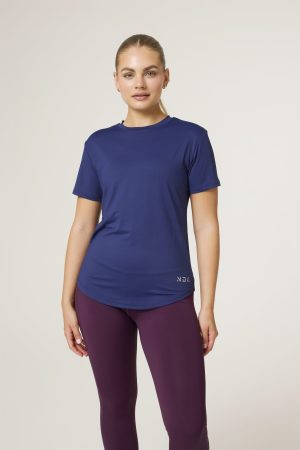 Introducing the Women's Training Tee (Navy) - the ultimate workout companion for fitness enthusiasts! Made with a perfect blend of polyester and spandex, this tee offers maximum comfort and flexibility for all your training needs. This tee not only looks great but also allows for a full range of motion during your workouts. But what sets this training tee apart is its innovative heat gear technology. This technology is designed to quickly and efficiently pull sweat away from your skin, keeping you dry and comfortable even during the most intense training sessions.